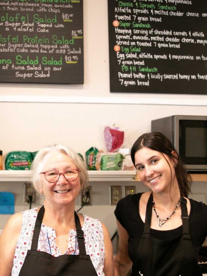 Another Beautiful Day team members behind the counter