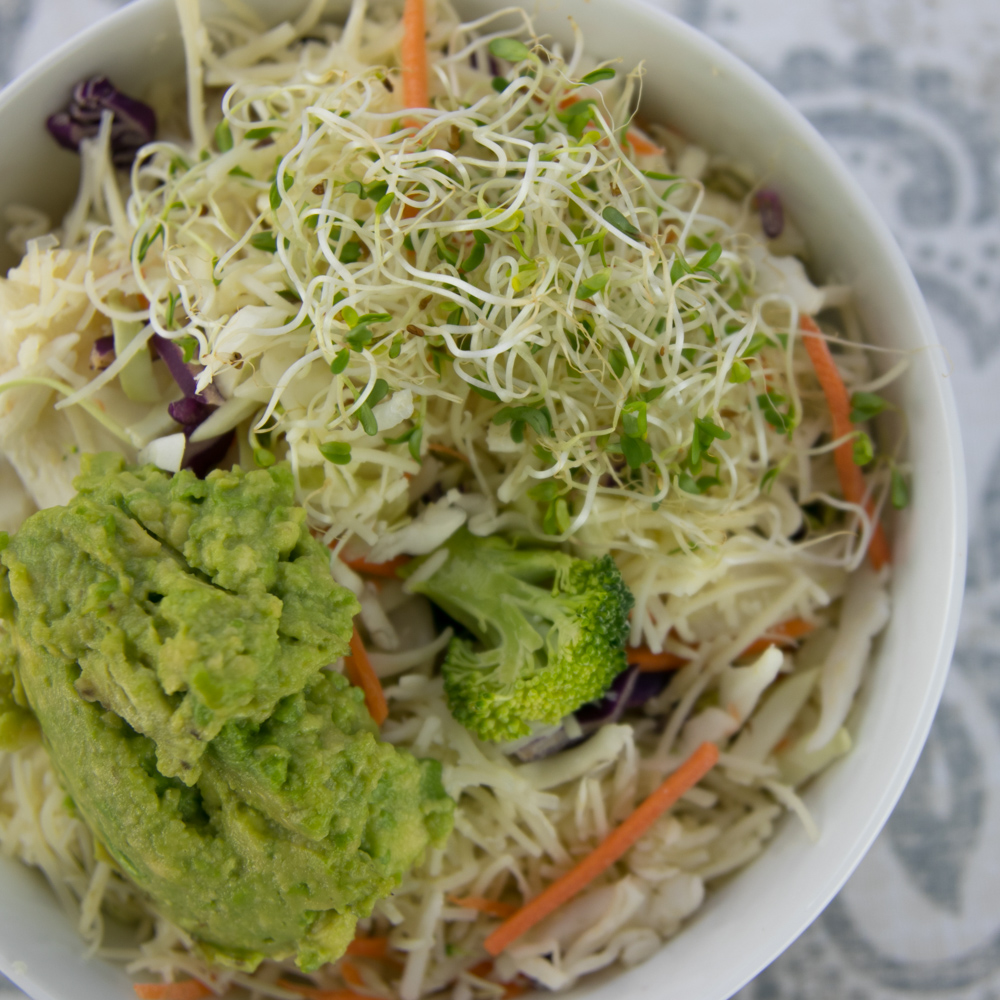 The Original Super Salad with cabbage, broccoli, cauliflower, carrots, sprouts and avocado